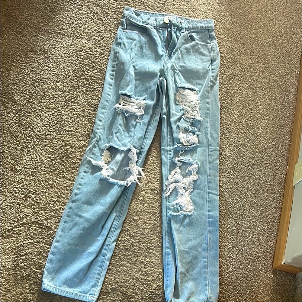 Women's Light Blue Distressed Jeans
